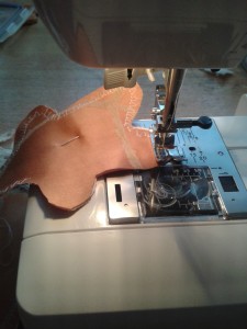 Sewing a gingerbread man